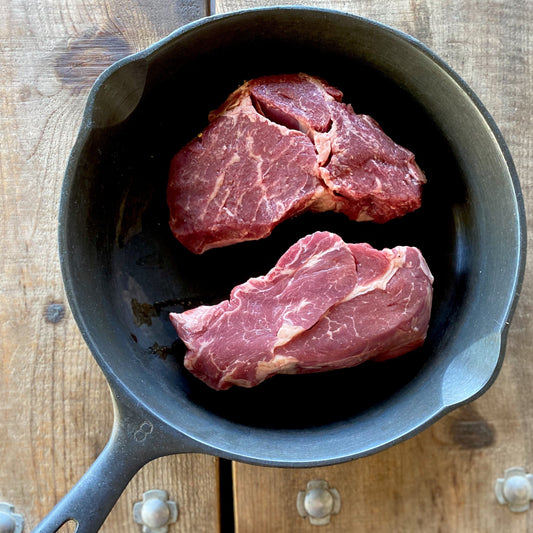 chuck eye steak in cast iron pan